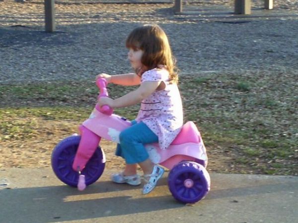 Her future Trike.....she climbs on all she sees