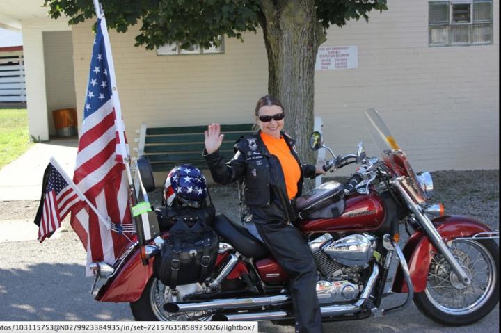 Flags on the bike for Run for the fallen